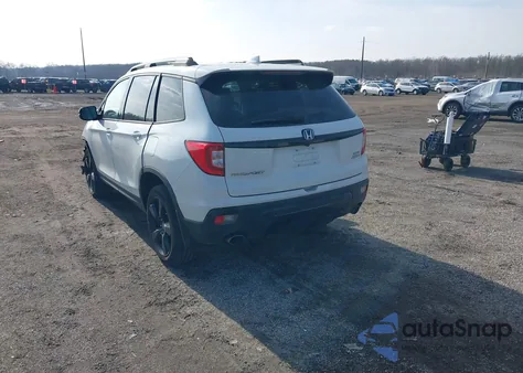 2019 Honda Passport Elite z USA, uszkodzony, nr VIN 5FNYF8H08KB025592